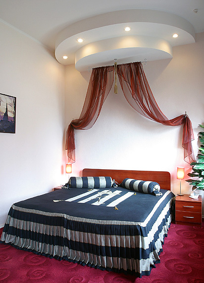 The bedroom of the luxury room